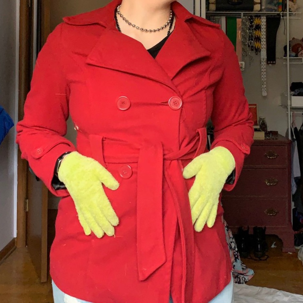 cherry red pea coat with soft lime green gloves